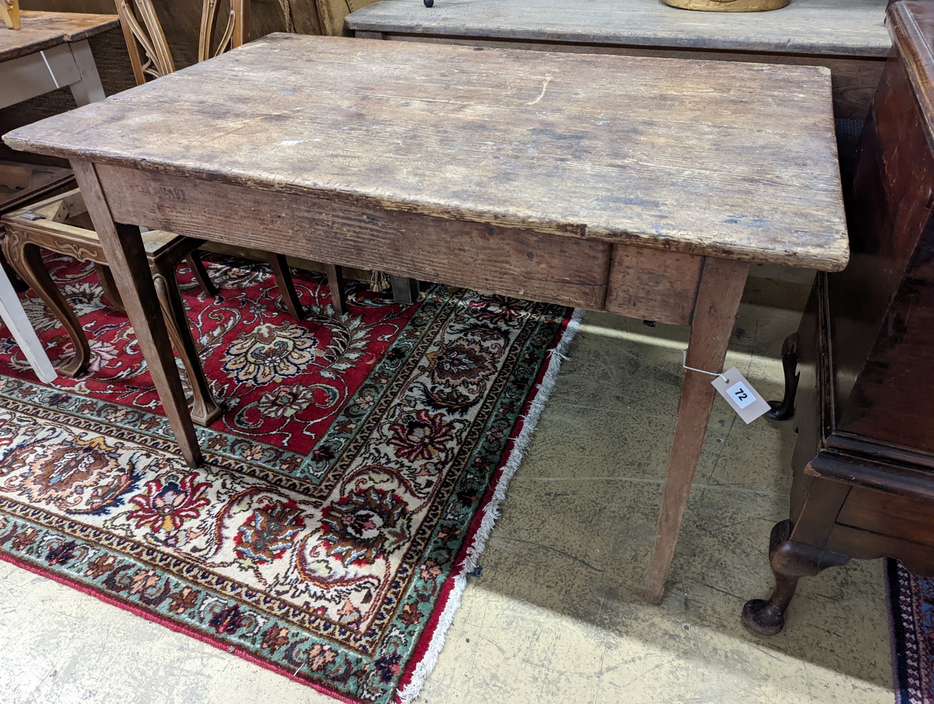 A 19th century French pine farmhouse table. W-120cm, D-74cm, H-74cm.